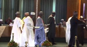 TINUBU SWEARS IN NEW COMMISSIONERS FOR RMAFC, NPC