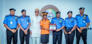 IGP Disu Honours Retired Traffic Officer Anifa Bello Abiodun for Outstanding Service